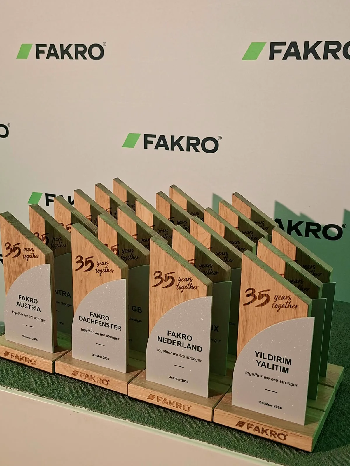 Oak wood awards for FAKRO's 35th anniversary engraved 35 years together
